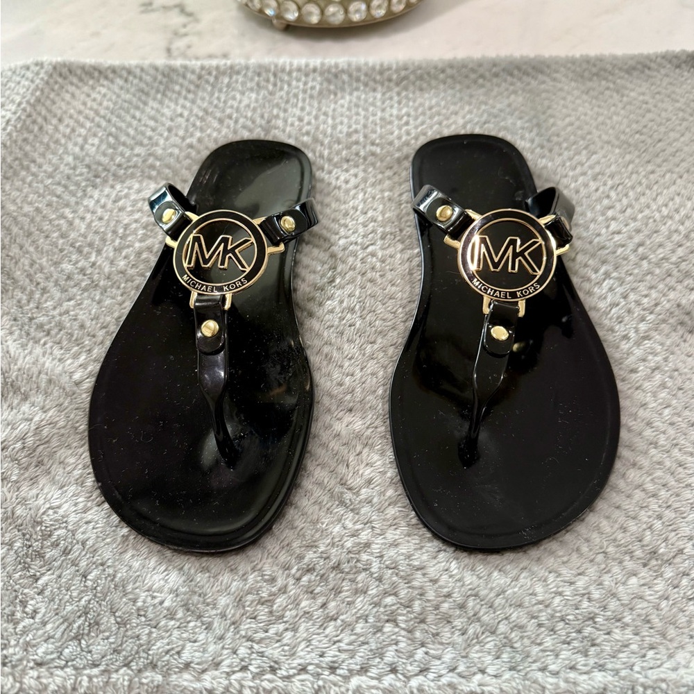 Michael Kors Black Sandals with Metallic Medallion
